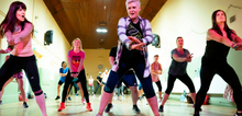 Small2_male-and-female-students-at-performing-arts-school-rehearsing-ballet-in-dance-studio-using-barre-768x512-5